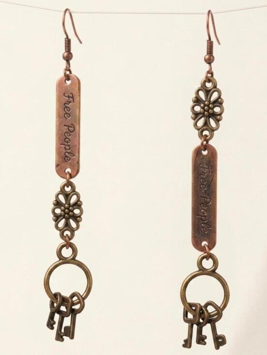 Free People Jewelry - Keeper's Secret Free People Mismatched Key Earrings